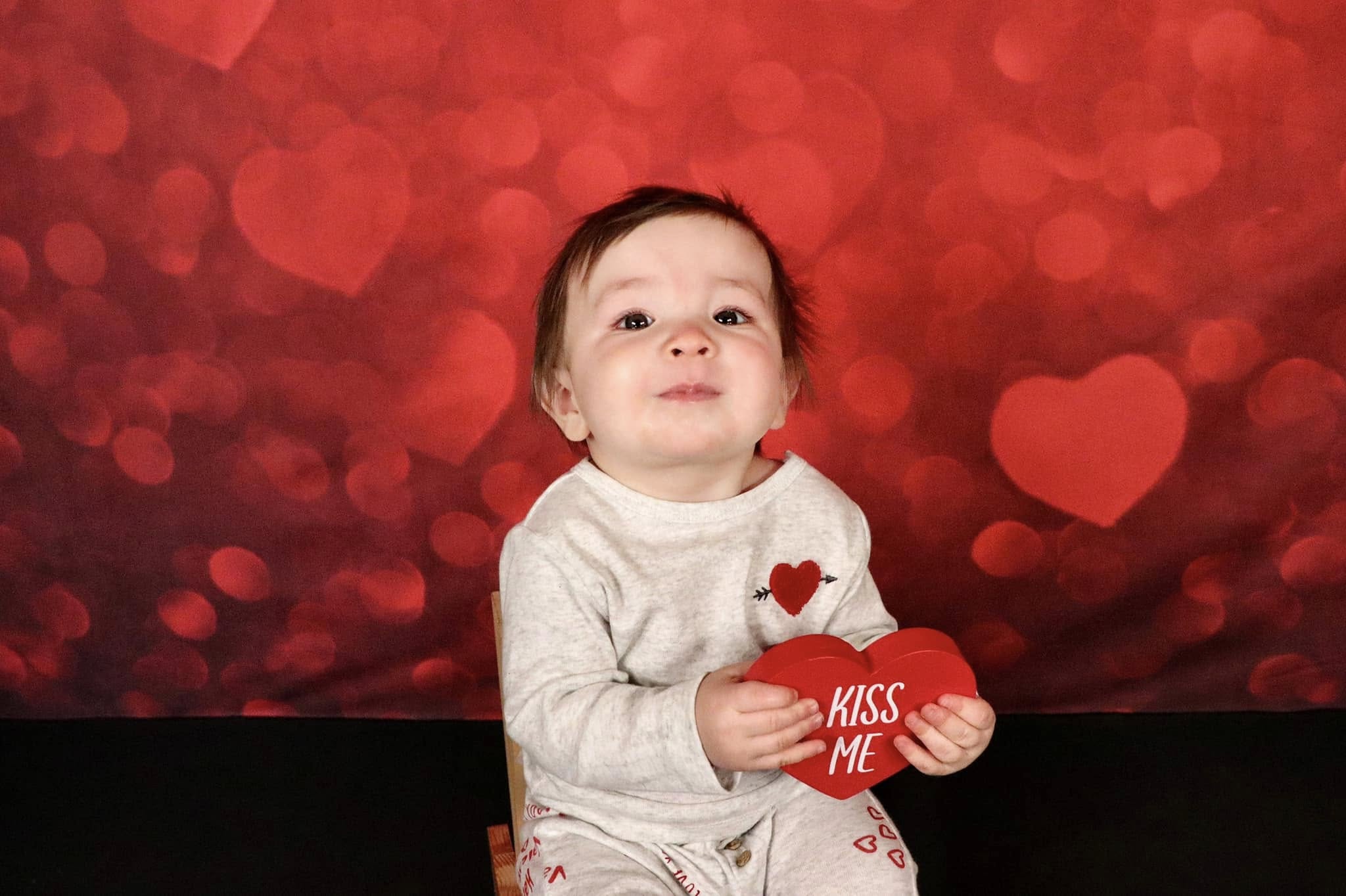Bokeh Roter Liebes-Herz-Valentinstag-Hintergrund D1040