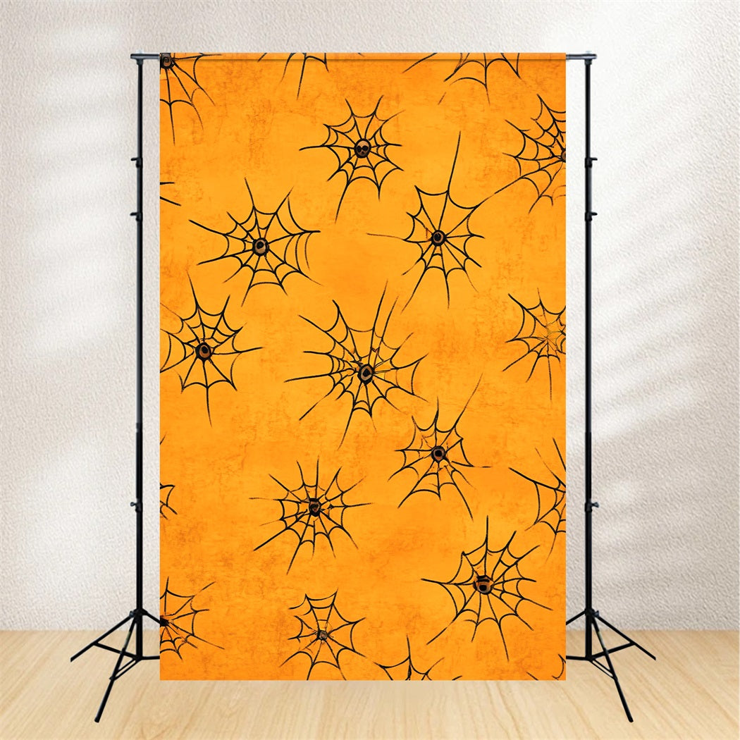 Farbbackdrop mit orangefarbenem Fotohintergrund und Spinnennetz-Muster Halloween-Fotobox-Backdrop LXX59-151