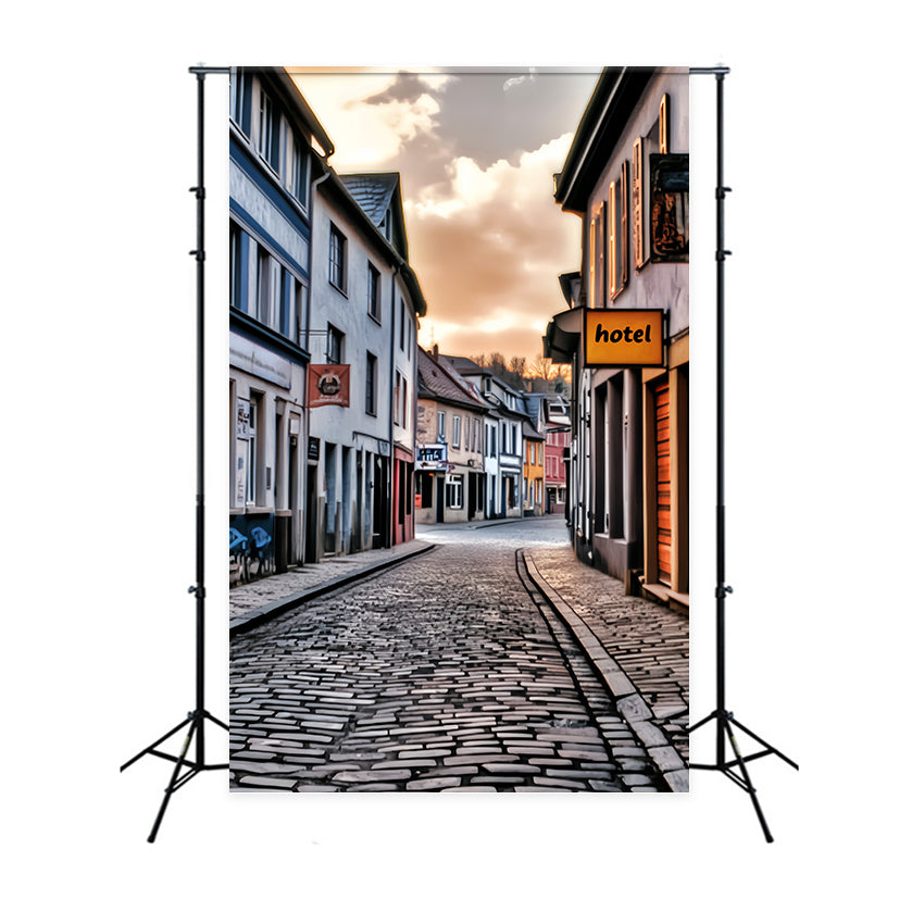 Europa-Fotohintergrund Kopfsteinpflasterstraße Sonnenuntergang Glanz Europäischer Fotohintergrund LXX59-56